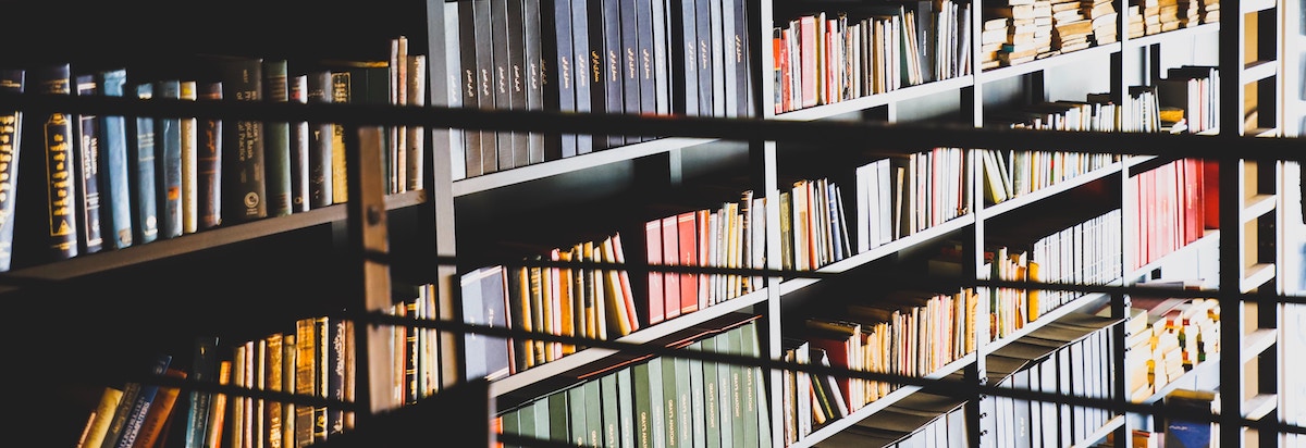 Books in a library for original economic research, investments, health, and more.