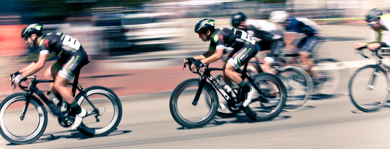 Athletic bikers participating in a road race.