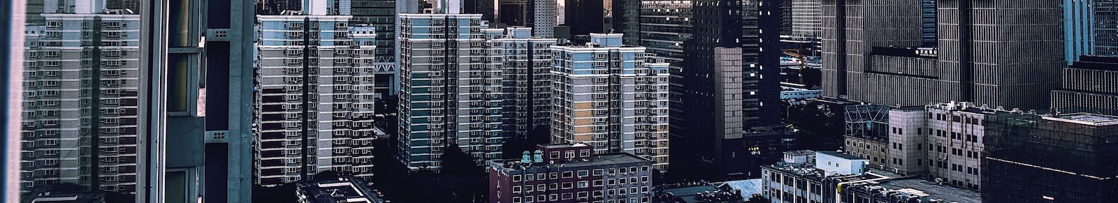 Buildings in a city representing a REIT return calculator