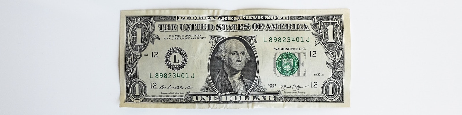 Dollar bill on a white background