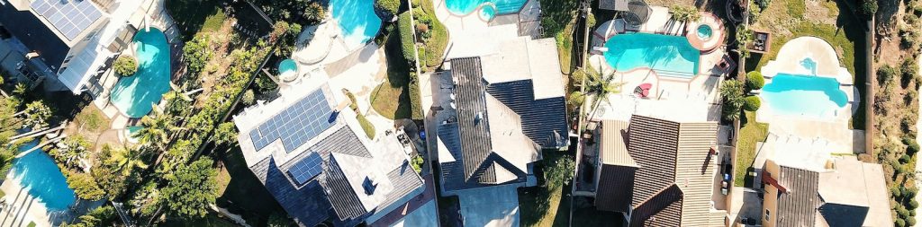Picture of expensive houses with pools