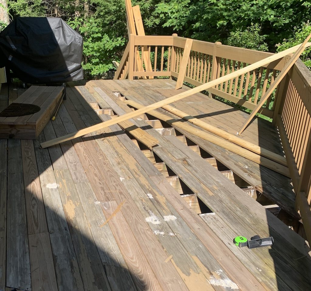 Picture of a New Hampshire deck destroyed by the snow.