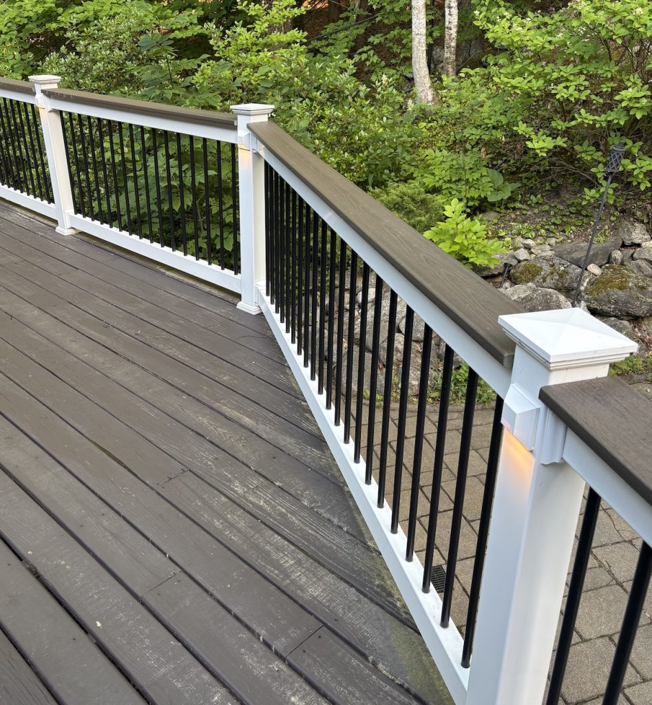 Picture of an angled deck drink rail with pole mounted lighting